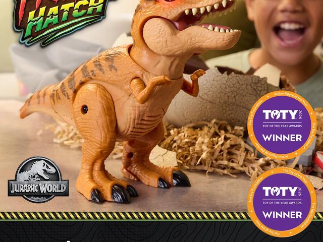 A Primal Hatch baby T-Rex next to its cracked egg